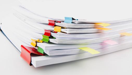 Stack of tax forms: Tips for investors and traders